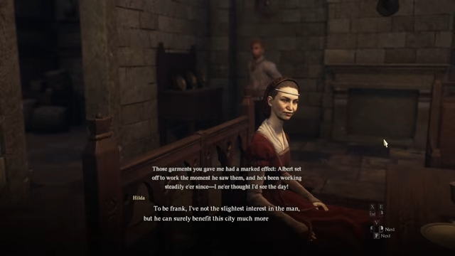 Hilda explaining that Albert has started working after receiving the garb